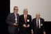 Prof. Grandon Gill, Chair of the Award Ceremony, and Dr. Nagib Callaos, General Chair, giving Prof. Andrés Tremante an award "In Appreciation for his Continuous Support as Co-Chair of the Organizing Committee of Several Conferences"